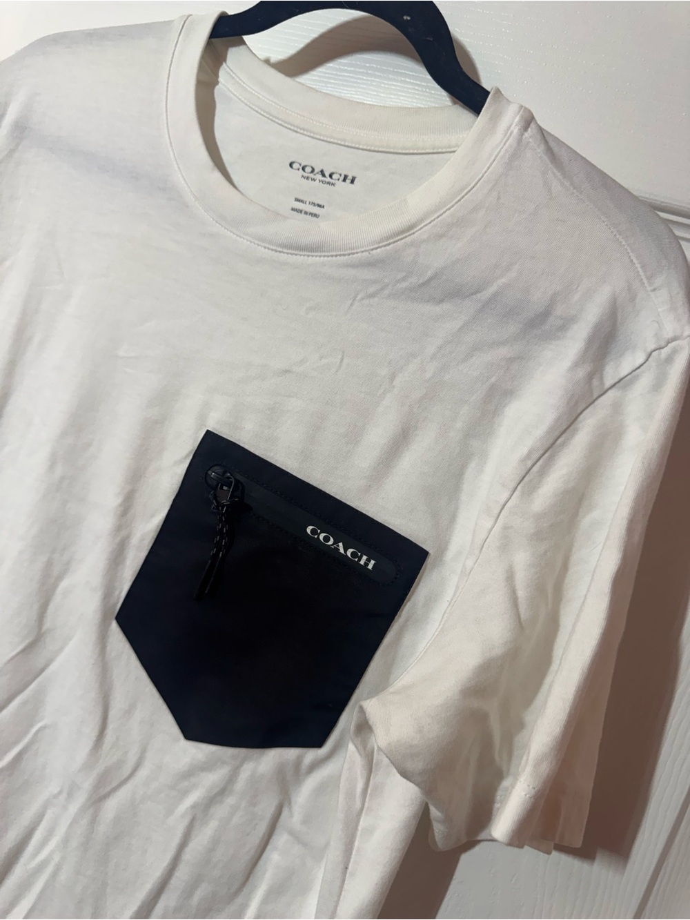 Coach White Short Sleeve Tee with Black Zip Pocket